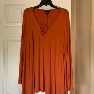 Long sleeve full and flowy tee with lattice v- neck